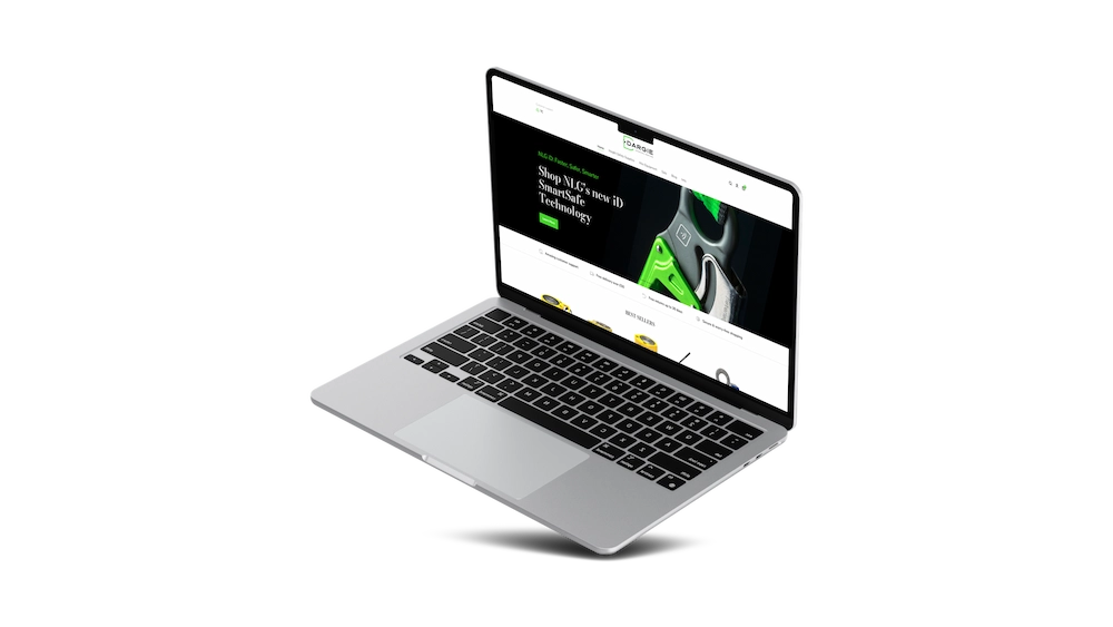 A laptop displaying a green-themed website with headphones and text about wireless audio technology and digital marketing.